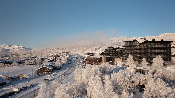 Riddergaarden vinterbilde med snø på trærne